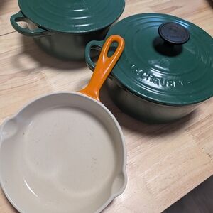Le Creuset Green and Cream Cookware with Orange Handle